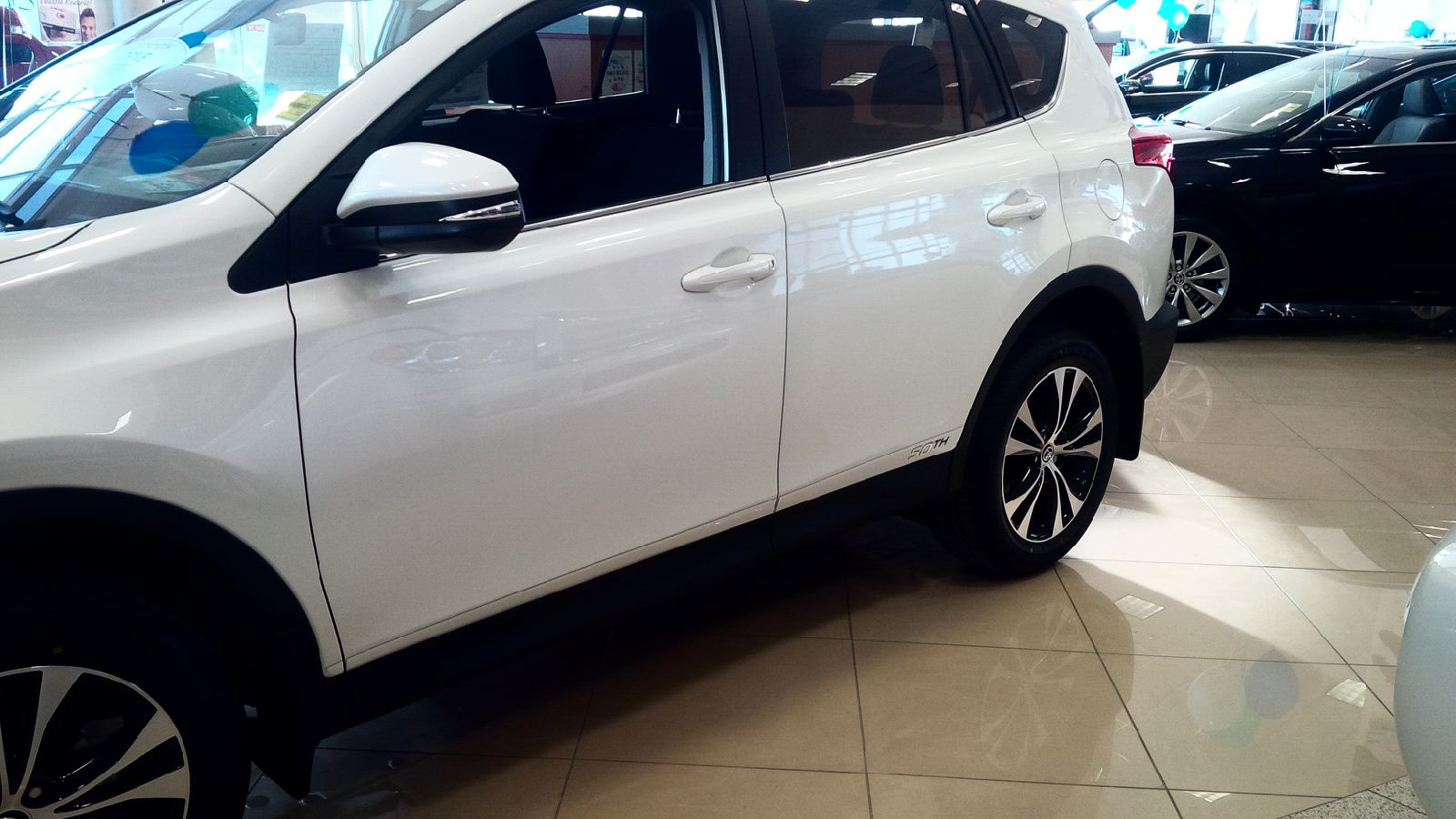 Rocker Trims for 2013-2015 Toyota RAV4 — 2